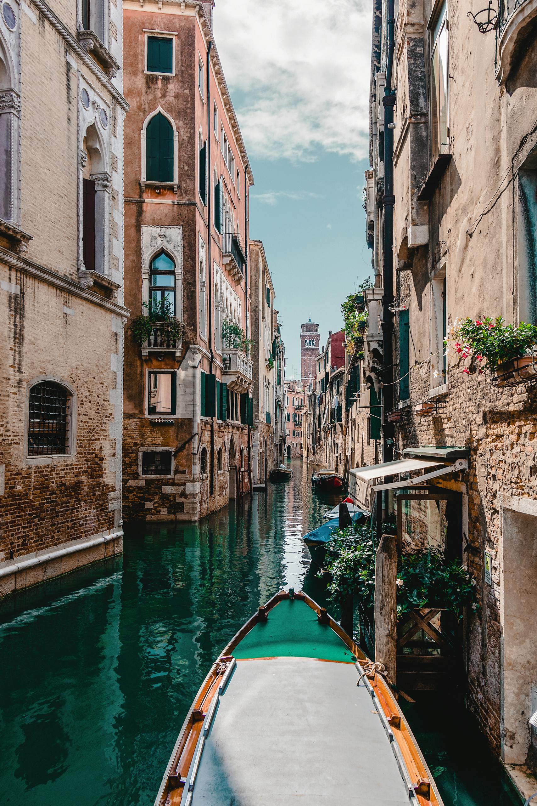 Captivating view of a traditional Venetian canal surrounded by historic buildings, perfect for travel enthusiasts.